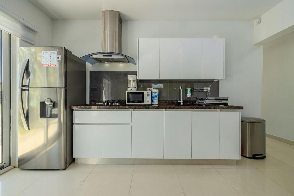 Koyari Modern Condos 9Br 7Ba Sleeps 26 W/ Pool And Roof Deck Palm Beach Bagian luar foto